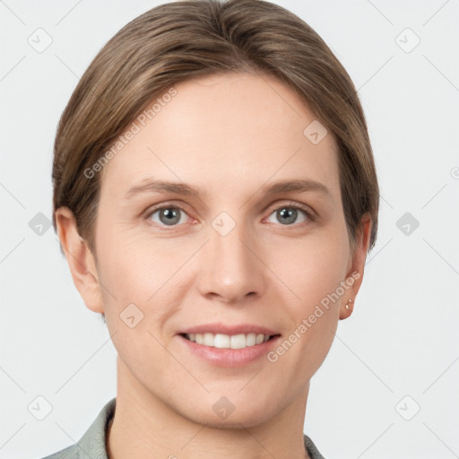 Joyful white young-adult female with short  brown hair and grey eyes