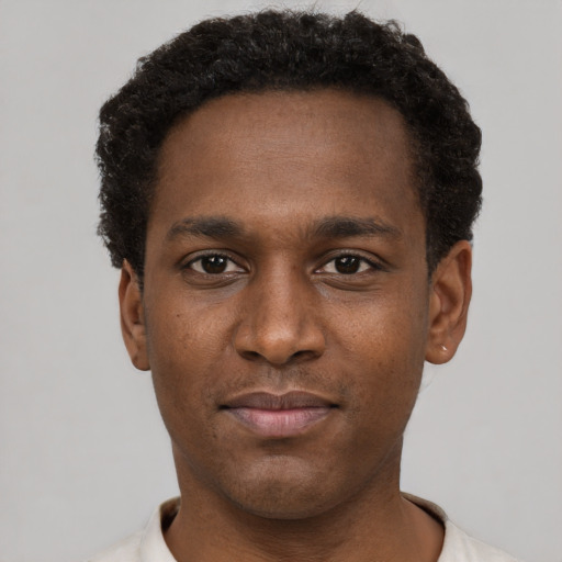 Neutral black young-adult male with short  brown hair and brown eyes