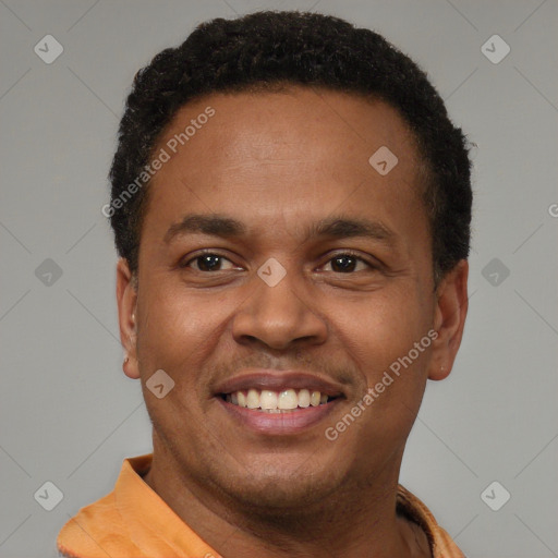 Joyful latino young-adult male with short  brown hair and brown eyes