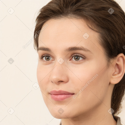 Neutral white young-adult female with long  brown hair and brown eyes