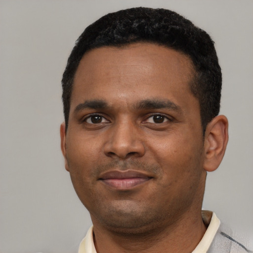 Neutral black young-adult male with short  black hair and brown eyes
