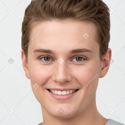 Joyful white young-adult female with short  brown hair and grey eyes