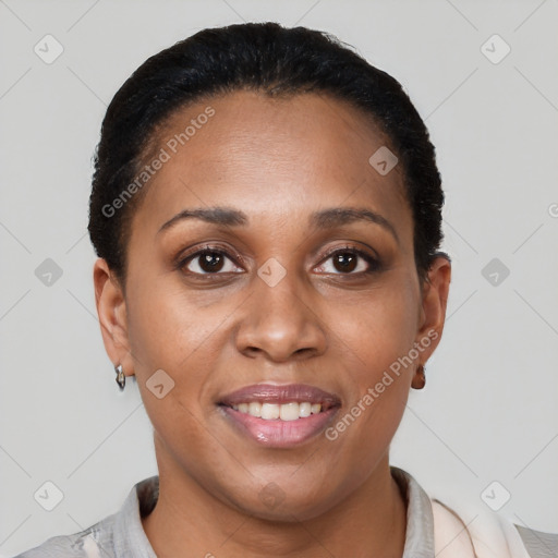 Joyful latino young-adult female with short  brown hair and brown eyes