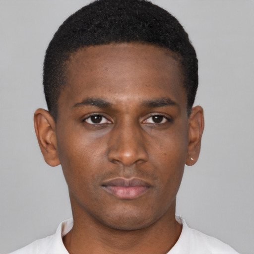 Neutral black young-adult male with short  black hair and brown eyes
