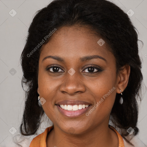 Joyful black young-adult female with medium  brown hair and brown eyes