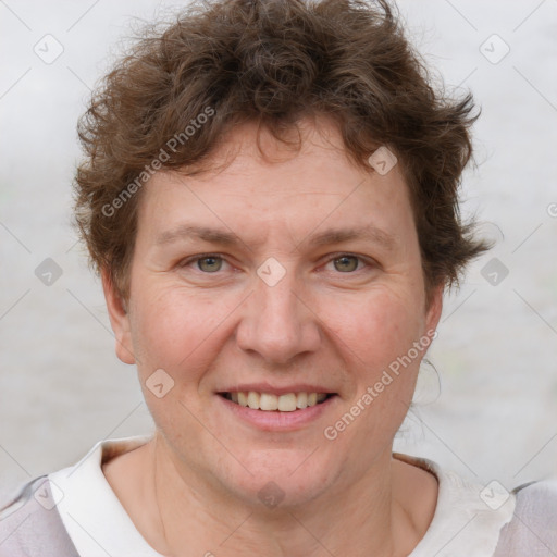 Joyful white adult female with short  brown hair and brown eyes