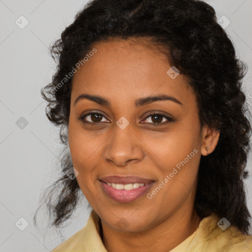 Joyful black young-adult female with medium  brown hair and brown eyes