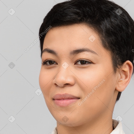 Joyful asian young-adult female with short  black hair and brown eyes