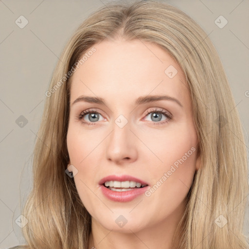 Joyful white young-adult female with long  brown hair and blue eyes