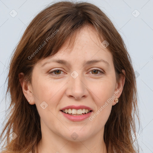 Joyful white adult female with long  brown hair and brown eyes