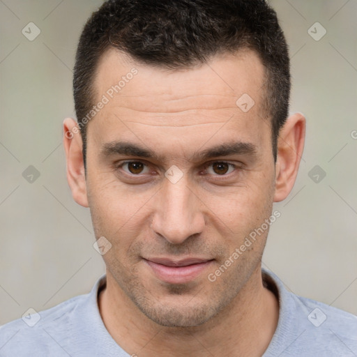 Joyful white young-adult male with short  brown hair and brown eyes