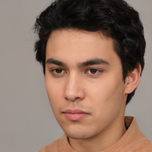 Neutral white young-adult male with short  black hair and brown eyes