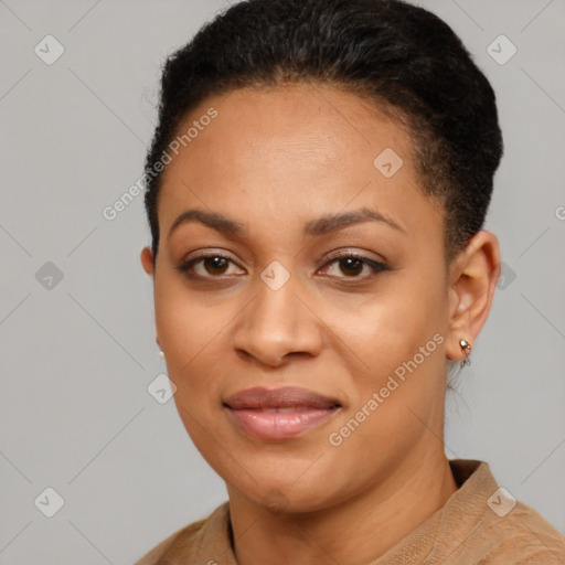 Joyful latino young-adult female with short  brown hair and brown eyes