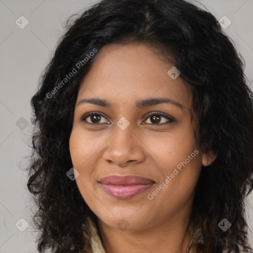 Joyful black young-adult female with long  brown hair and brown eyes