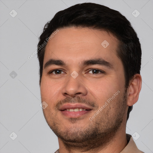 Joyful white young-adult male with short  black hair and brown eyes