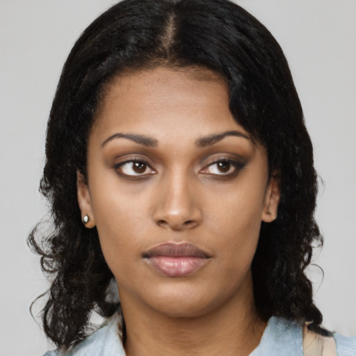 Neutral latino young-adult female with medium  black hair and brown eyes