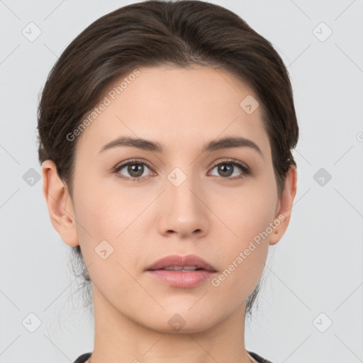 Neutral white young-adult female with short  brown hair and brown eyes