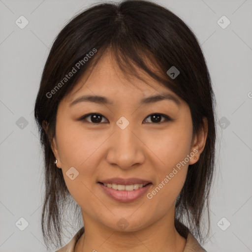 Joyful asian young-adult female with medium  brown hair and brown eyes