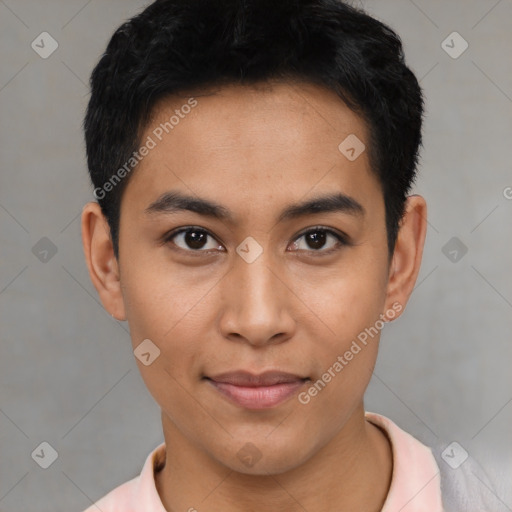 Joyful latino young-adult male with short  black hair and brown eyes