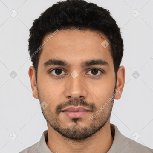 Neutral latino young-adult male with short  black hair and brown eyes