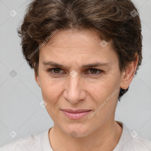 Joyful white adult female with short  brown hair and brown eyes