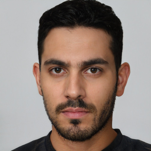 Neutral latino young-adult male with short  black hair and brown eyes
