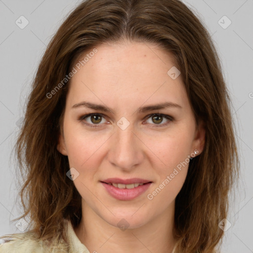 Joyful white young-adult female with long  brown hair and green eyes