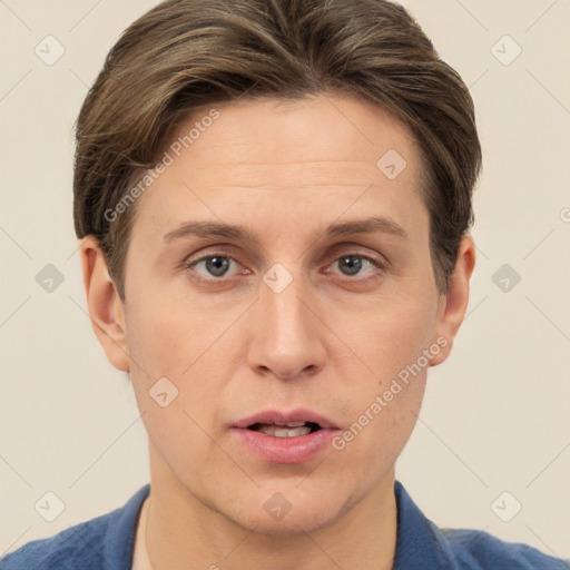 Joyful white adult male with short  brown hair and grey eyes