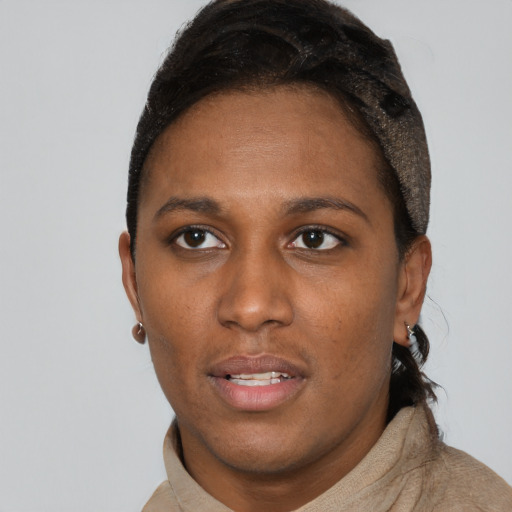 Neutral black young-adult female with short  brown hair and brown eyes