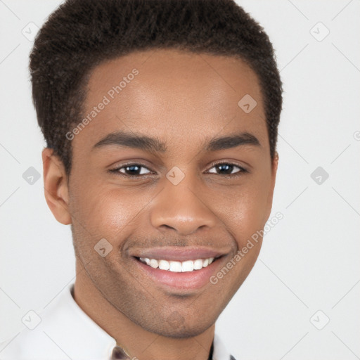 Joyful black young-adult male with short  brown hair and brown eyes