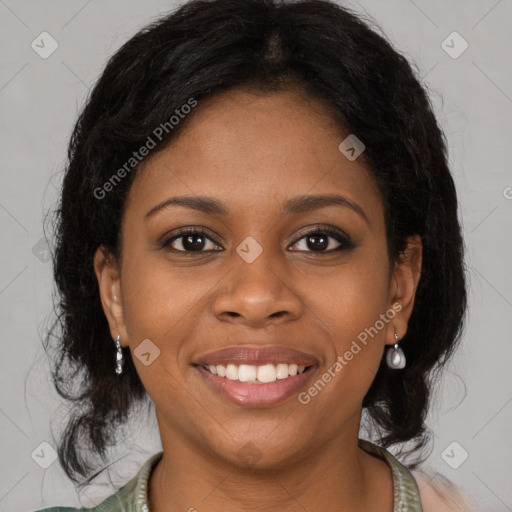 Joyful black young-adult female with medium  brown hair and brown eyes