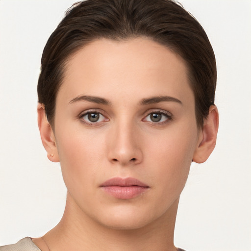 Neutral white young-adult female with short  brown hair and brown eyes