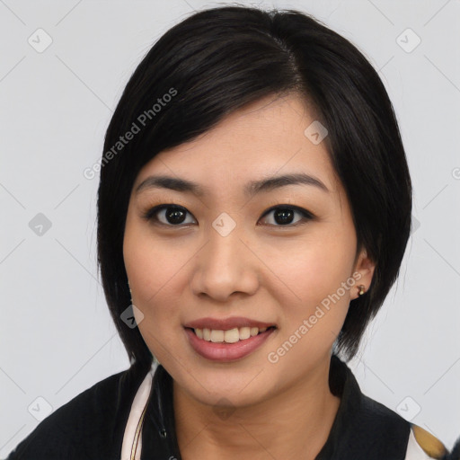 Joyful asian young-adult female with medium  black hair and brown eyes