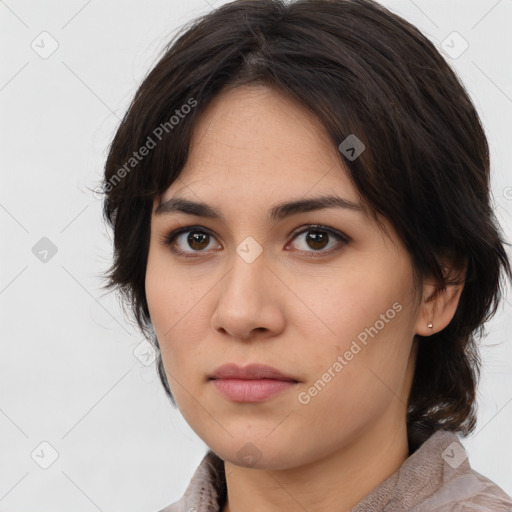 Neutral white young-adult female with medium  brown hair and brown eyes