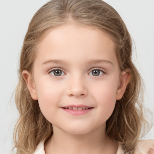 Joyful white child female with medium  brown hair and grey eyes