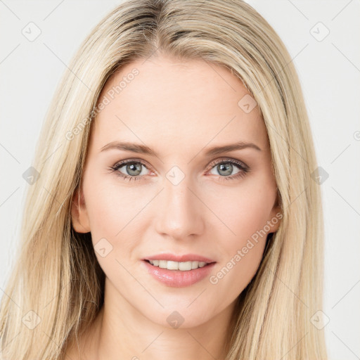 Joyful white young-adult female with long  brown hair and blue eyes