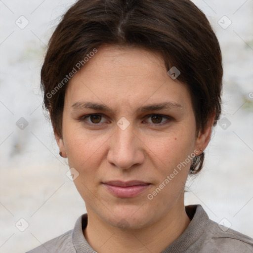 Joyful white adult female with short  brown hair and brown eyes