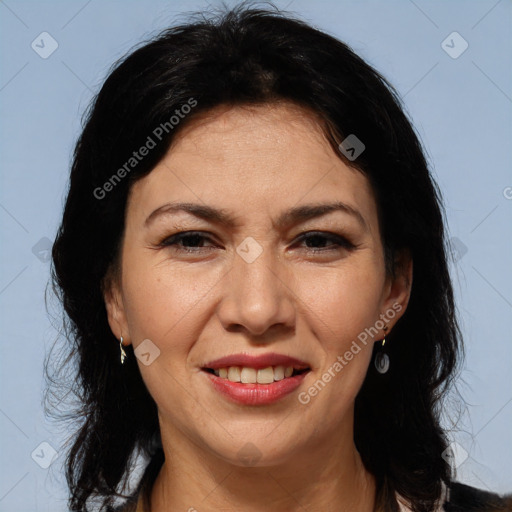 Joyful white adult female with medium  brown hair and brown eyes