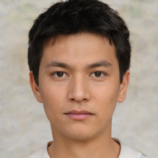 Neutral asian young-adult male with short  brown hair and brown eyes