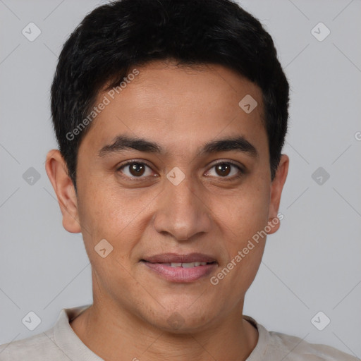 Joyful latino young-adult male with short  brown hair and brown eyes