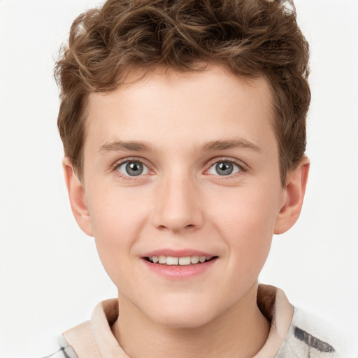 Joyful white child male with short  brown hair and grey eyes