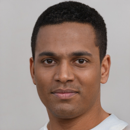 Neutral black young-adult male with short  black hair and brown eyes