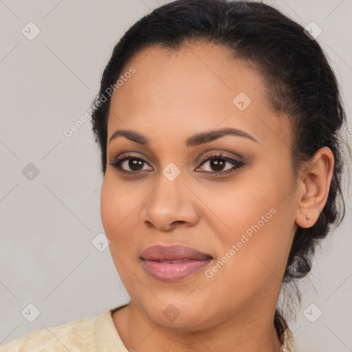 Joyful latino young-adult female with medium  brown hair and brown eyes