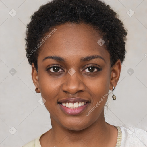 Joyful black young-adult female with short  black hair and brown eyes