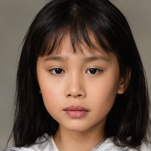 Neutral asian child female with medium  brown hair and brown eyes