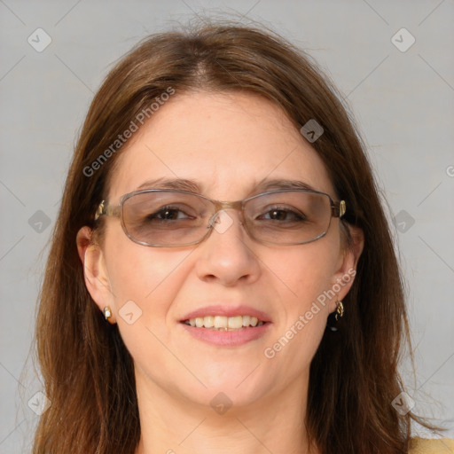 Joyful white adult female with long  brown hair and brown eyes