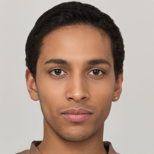 Neutral latino young-adult male with short  brown hair and brown eyes