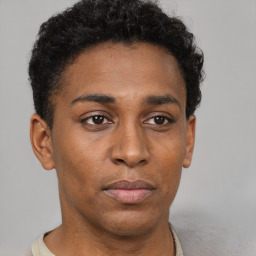 Neutral black young-adult male with short  brown hair and brown eyes