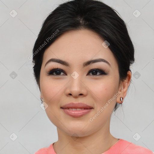 Joyful asian young-adult female with medium  black hair and brown eyes