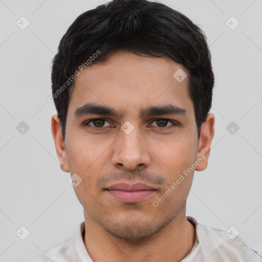 Neutral latino young-adult male with short  black hair and brown eyes